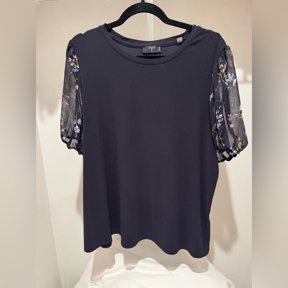 Navy blue blouse with sheer floral sleeves